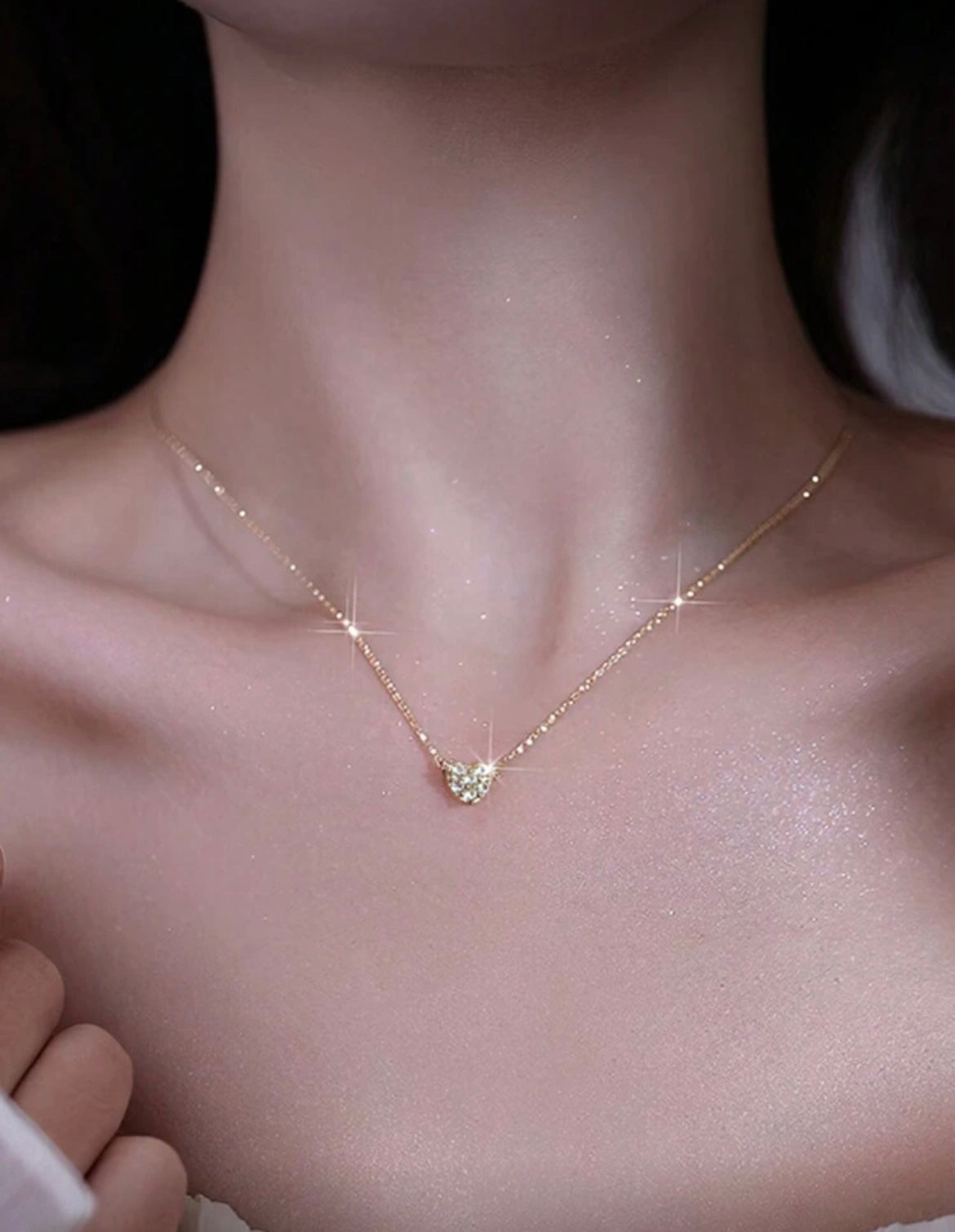 Collier doré avec pendentif coeur