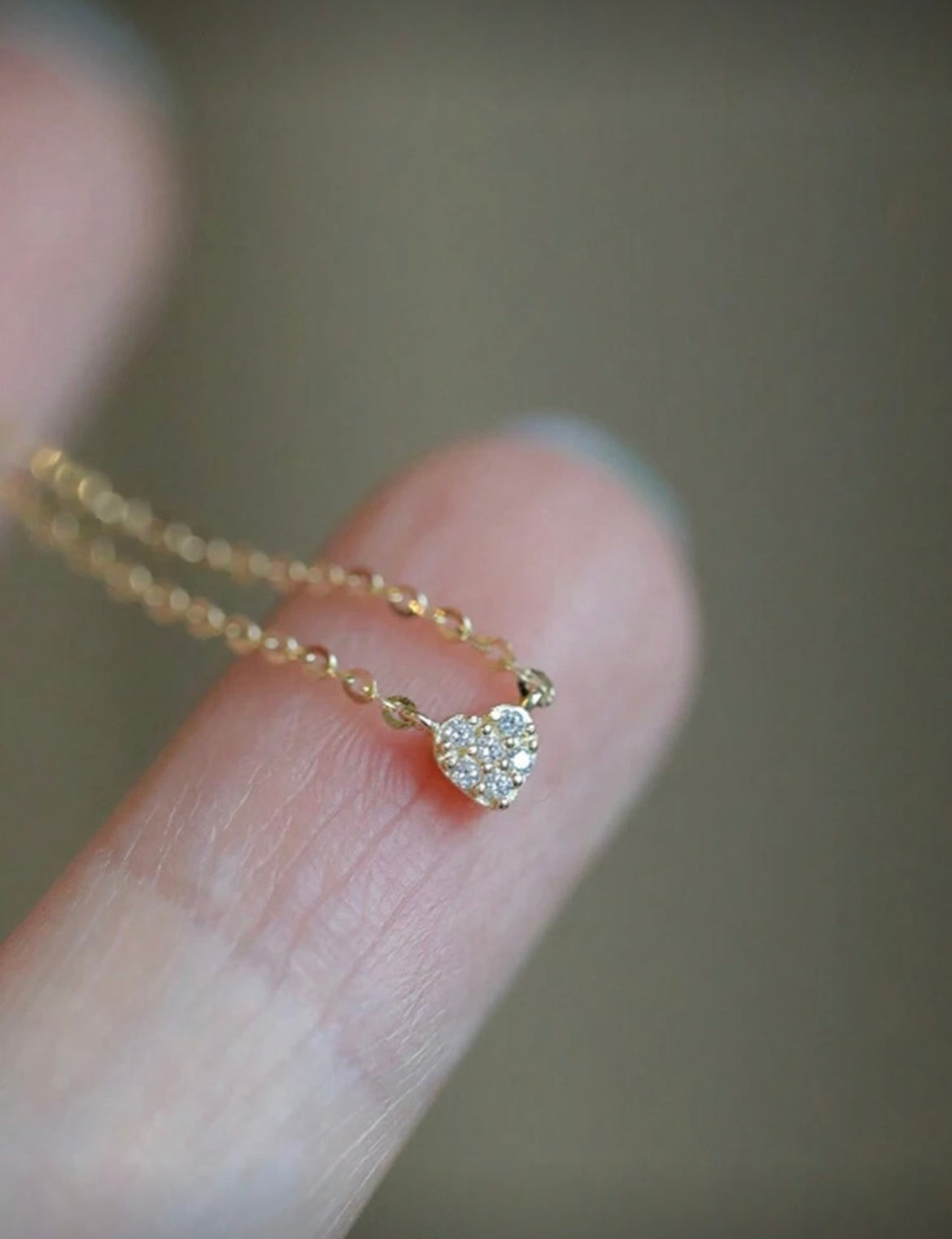 Collier doré avec pendentif coeur